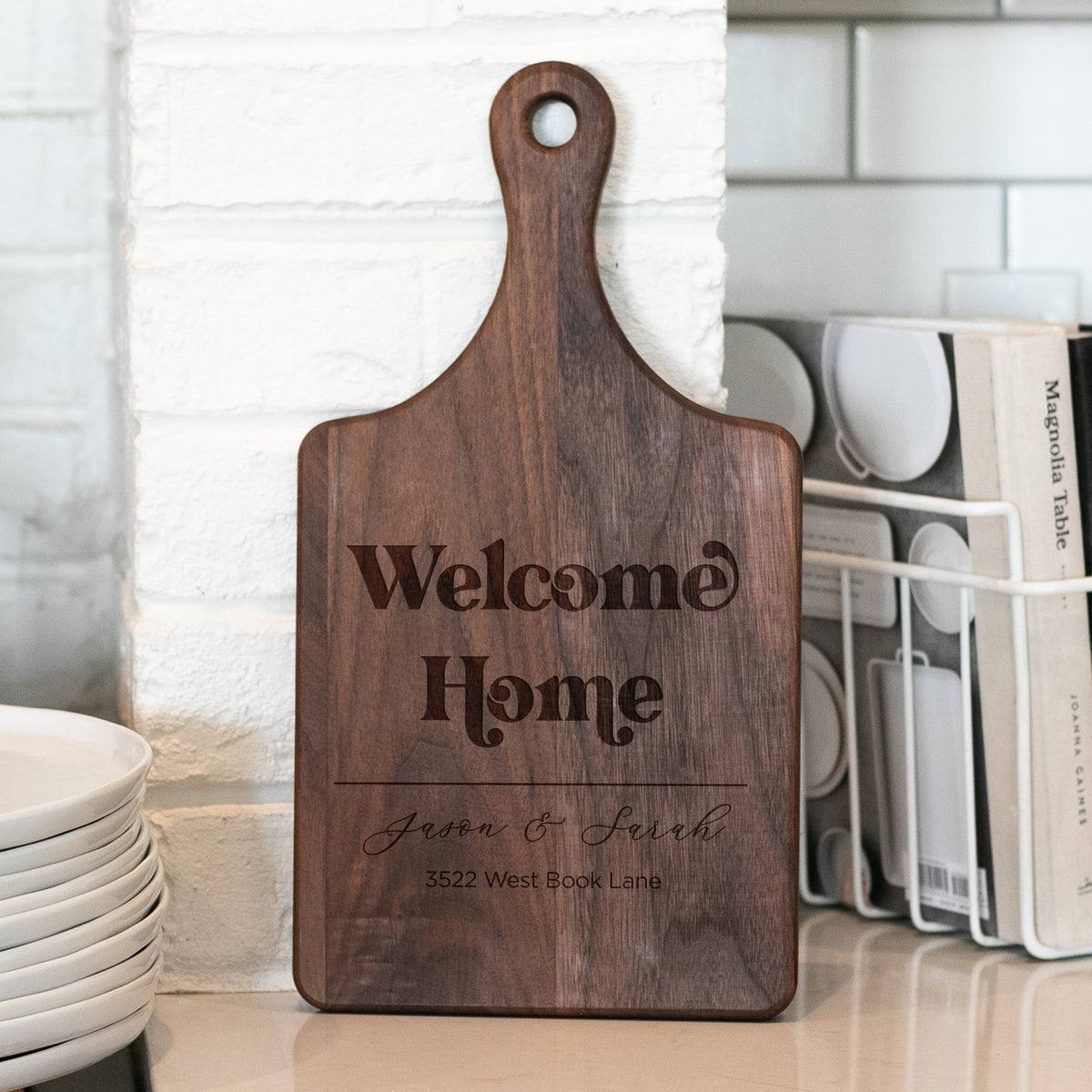 a wooden cutting board sitting on top of a counter