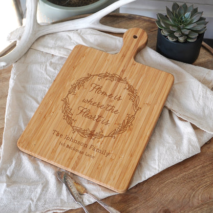 a wooden cutting board with a engraved message on it