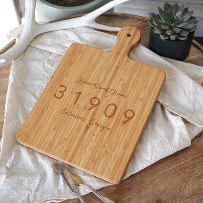 a cutting board with a date engraved on it