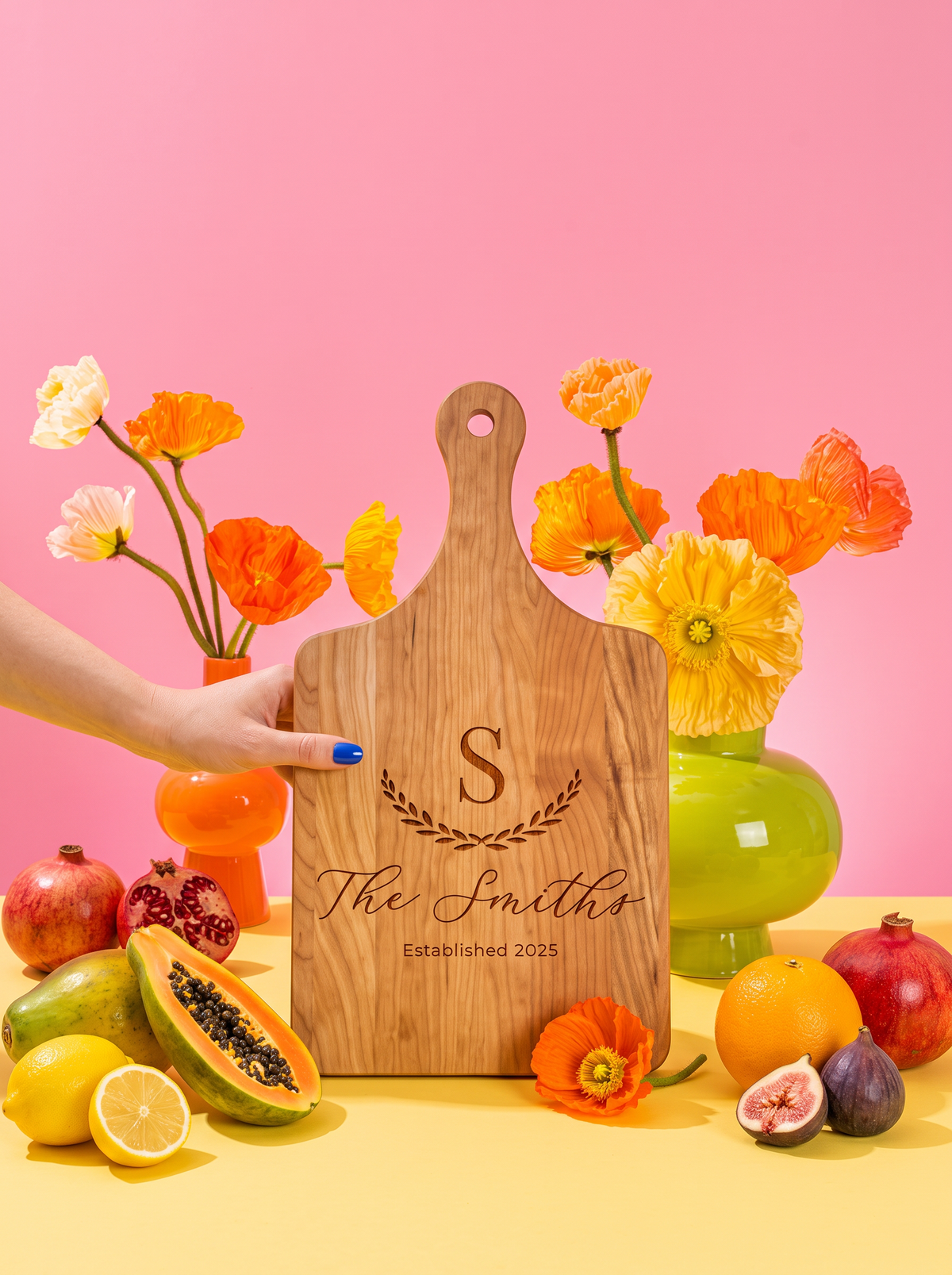 Large Initial Family Name Cutting Board in a colorful floral setting