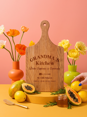 Grandma’s Kitchen Personalized Cutting Board in a colorful floral setting
