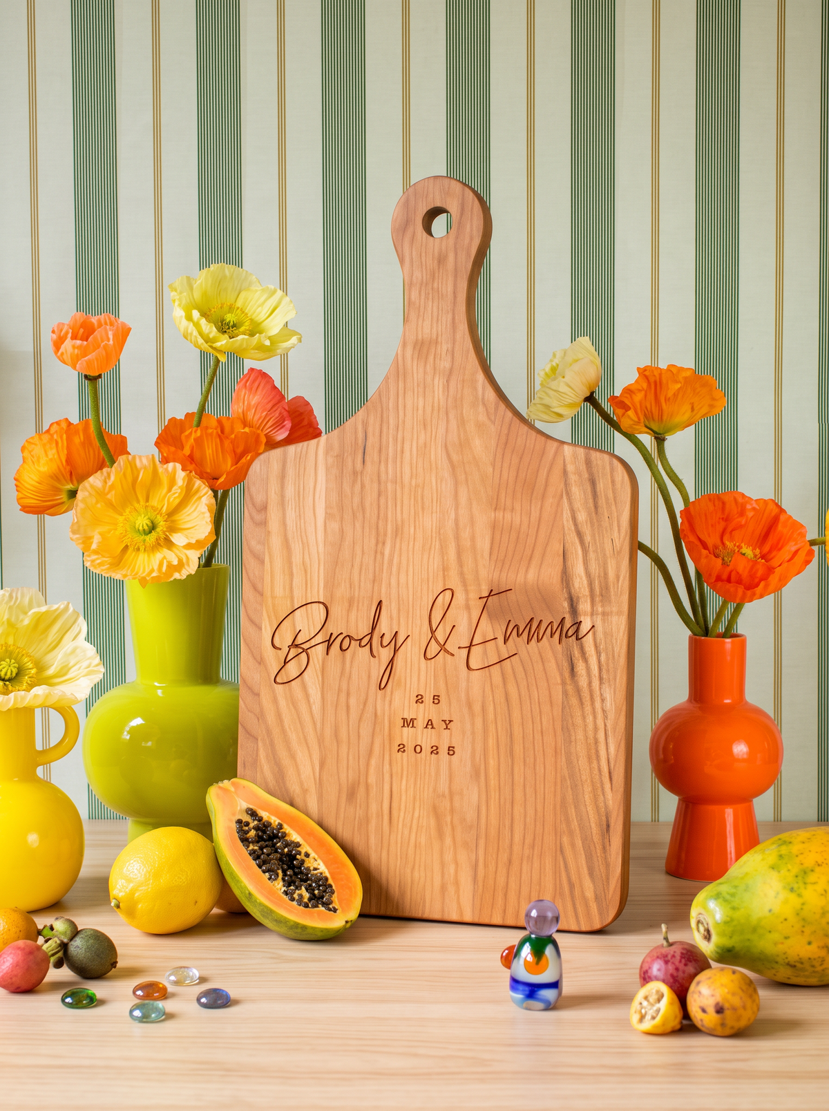 Modern Script Wedding Date Cutting Board in a colorful floral setting