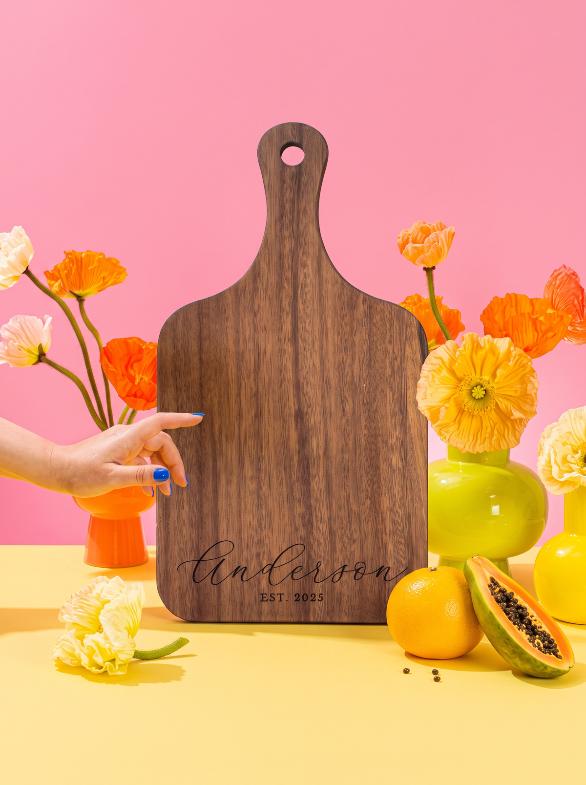 Custom Cursive Text Cutting Board in a colorful floral setting