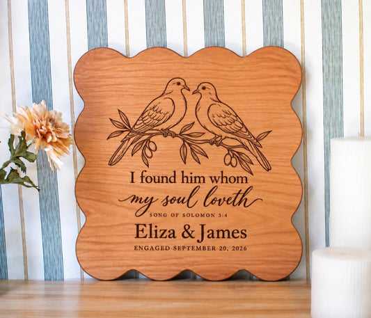 Edited mockup of my soul dove and Song of Solomon engraving on a cherry scalloped board, personalized Eliza & James with their engagement date.