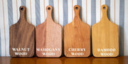 Four paddle board material examples labeled walnut, mahogany, cherry and bamboo.