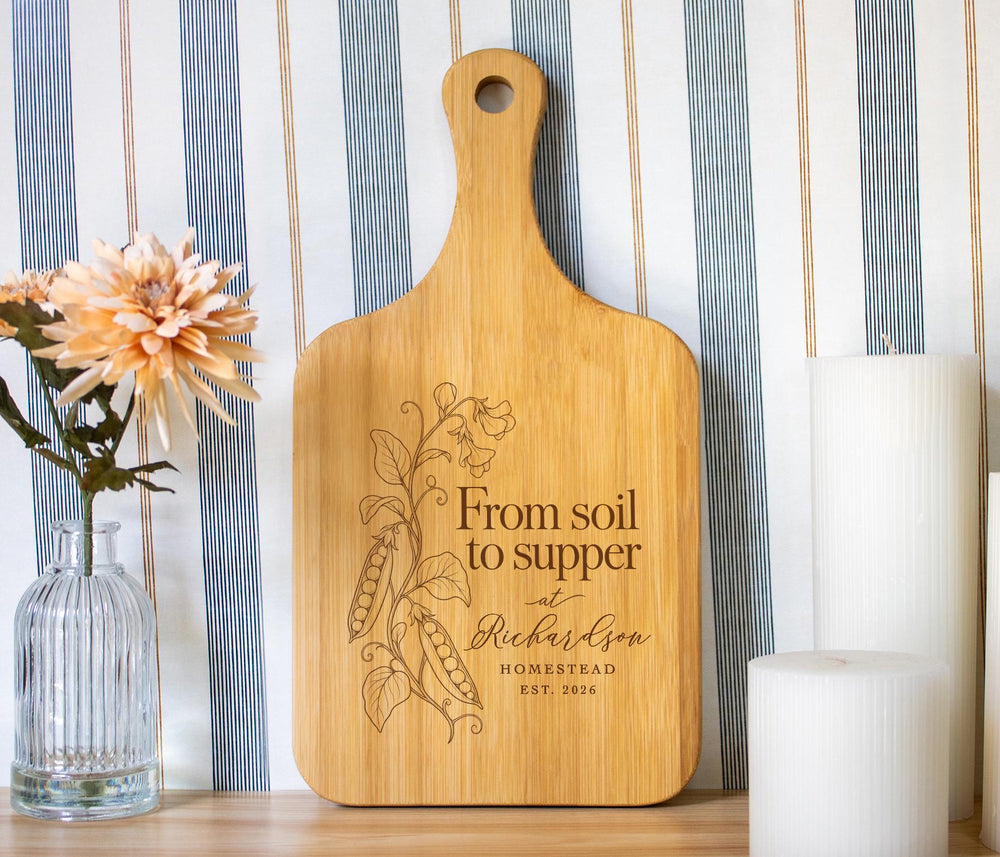 Soil to Supper cutting board mockup with a climbing pea vine and sample Richardson Homestead personalization.