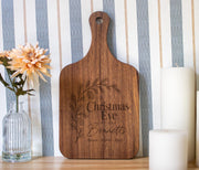 Personalized Christmas Eve cutting board; edited mockup.