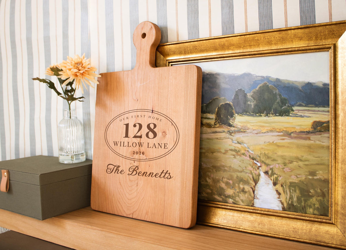 Personalized First Home Plaque cutting board; edited mockup.