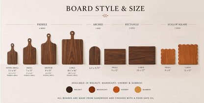 a variety of wooden cutting boards in different sizes and styles, ranging from paddle boards to square boards, and from small to large.