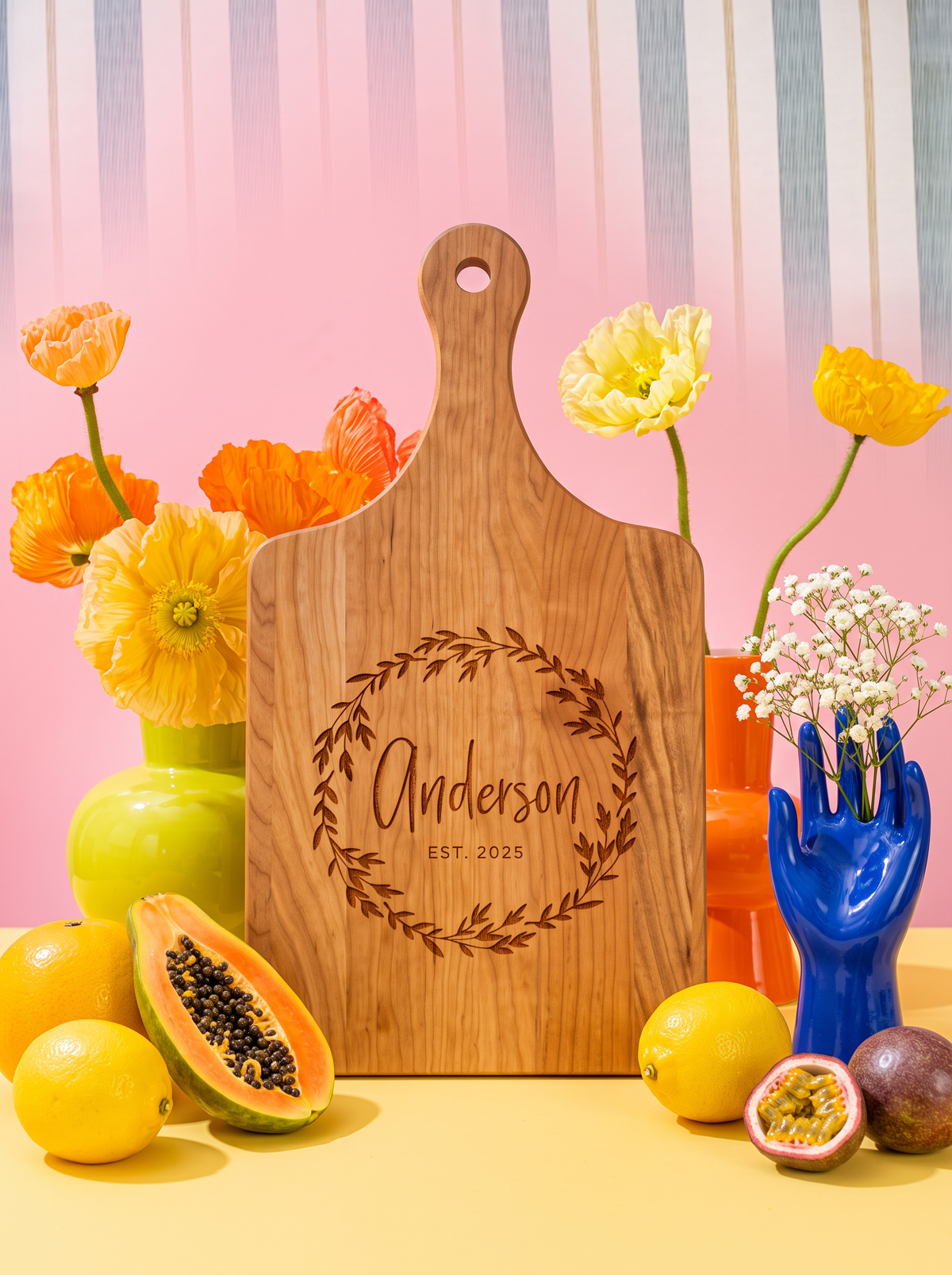Leaf Wreath Family Name Cutting Board in a colorful floral setting