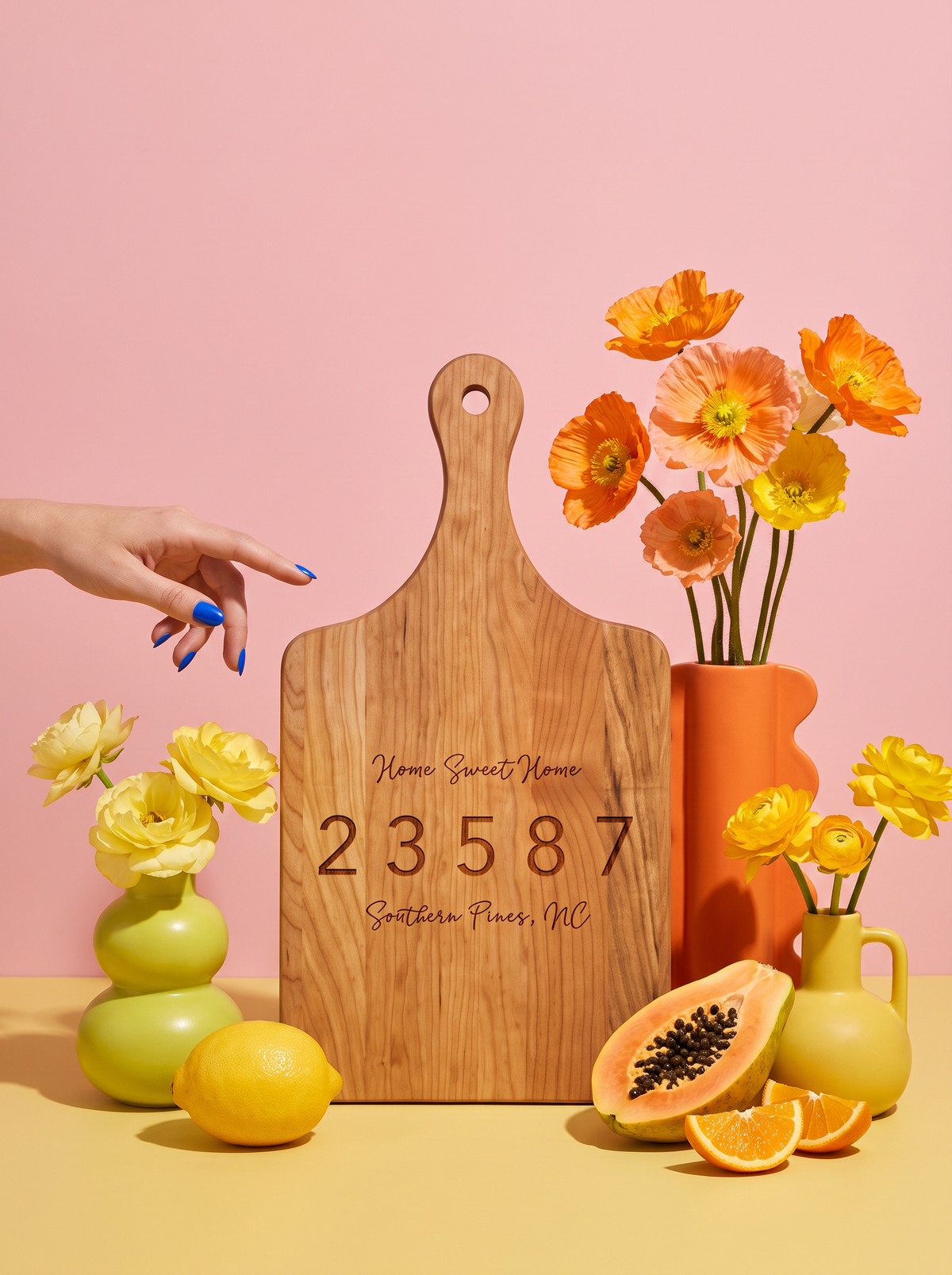 Home Sweet Home Zip Code Cutting Board in a colorful floral setting